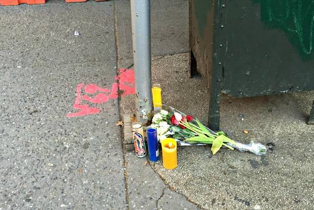 A memorial for James Gregg at the corner of 6th Avenue and Sterling Place.